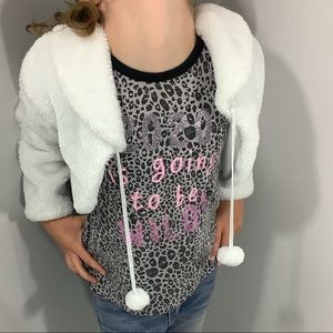 The white fluffy coat